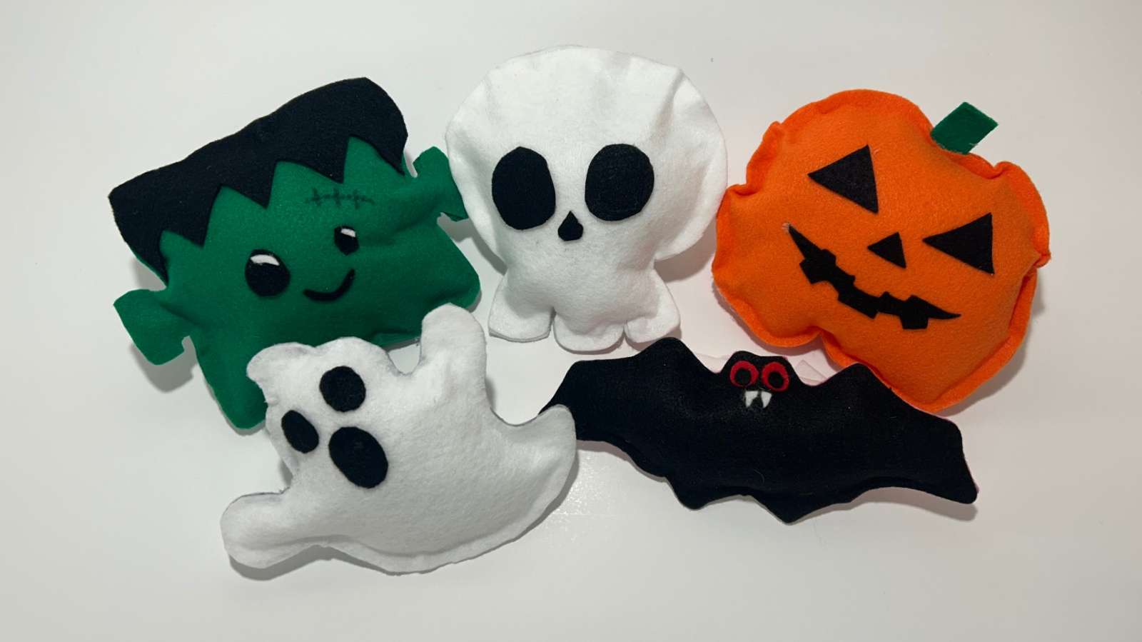 5 felt plushies: frankenstein, ghost, skull, bat, pumpkin
